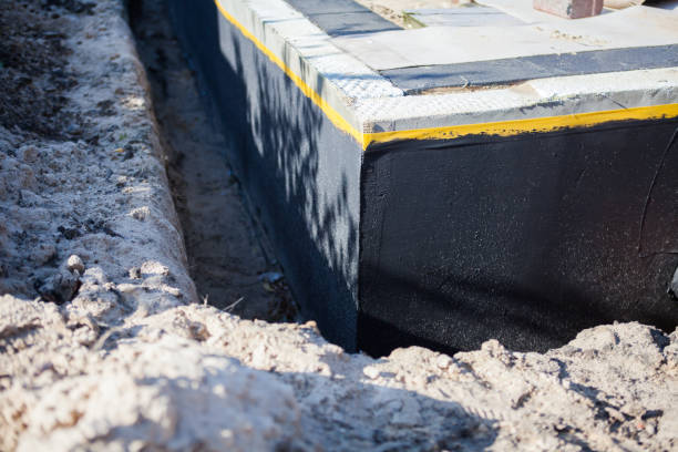 Professional Basement Waterproofing technician working in Murfreesboro, NC